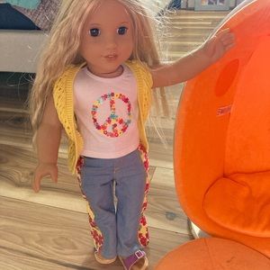 American girl doll and egg chair